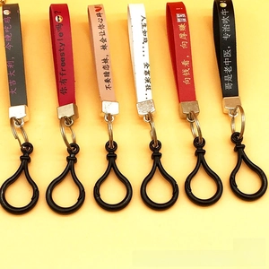 Detailed close-up of colorful leather wristlet keychains with metallic ring and plastic hooks