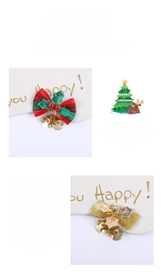 Detail of Christmas plaid bows and golden bells with pine needles and berry ornaments