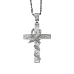 Detail of silver ankh cross pendant with snake wrap and sparkling crystal rhinestones