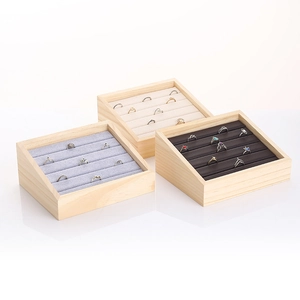 Solid wood ring display trays with velvet slots in grey, beige, and dark brown finishes
