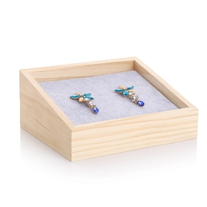 Solid wood jewelry display tray with grey velvet lining and minimalist design