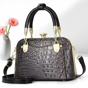 Women's dark grey crocodile texture handbag with gold hardware and top ring handles
