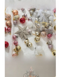 Detailed set of varied texture Christmas ball ornaments with silver glitter tree topper star