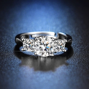 Macro detail of six-prong silver ring with a one-carat round brilliant cubic zirconia stone