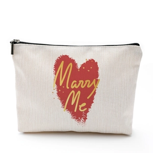 Waterproof cotton linen makeup bag with Marry Me heart print and zipper closure