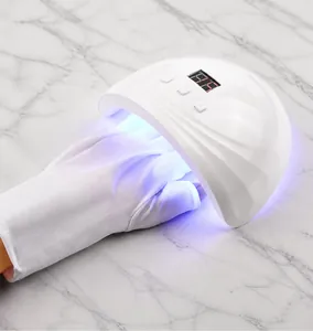 UV protection manicure gloves and LED nail lamp showing anti-tanning skin protection