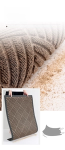 Brown textured entryway doormat with non-slip edges showing dust removal and cleaning detail