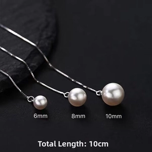 Detail view of S925 silver pearl threader earrings showing 10cm length and bead sizes