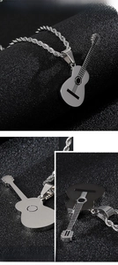 Detail view of silver stainless steel guitar pendant with black etched strings and rope chain