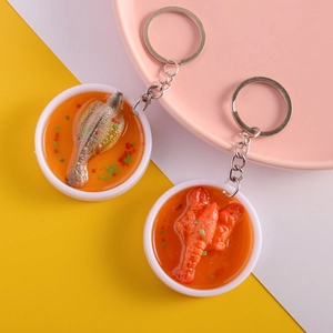 Creative PVC simulation food keychain featuring realistic lobster and fish in a bowl