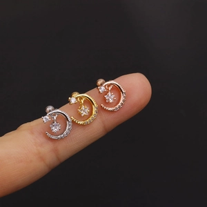 Three-piece set of geometric moon and star stud earrings in silver, gold, and rose gold