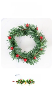 Detailed view of artificial Christmas candle ring with pine needles and red berries 10cm