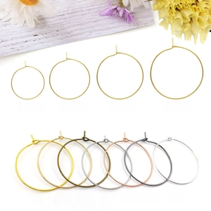 Detail view of round DIY earring hoop components in four sizes and seven metal finishes
