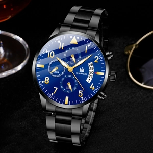 Men's business quartz watch with blue dial, gold markers, and black steel strap on textured base