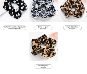 Detailed set of four scrunchies featuring leopard and polka dot prints in soft velvet fabric