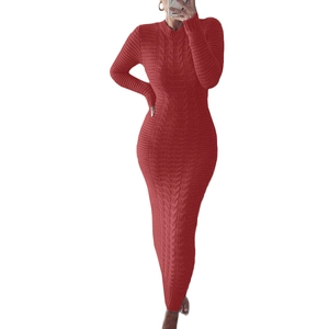 Detailed close-up of cable knit texture and ribbing on deep red slim fit dress