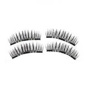 Four pairs of natural black magnetic eyelashes arranged in two rows on white background