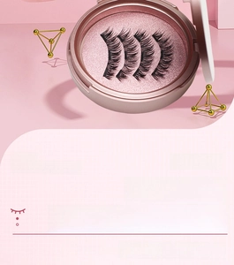 Detailed close-up of three pairs of dense black magnetic false eyelashes in a rose gold case
