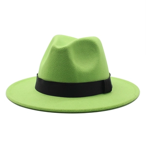 Detail view of neon green wool fedora hat with classic black ribbon band and flat brim