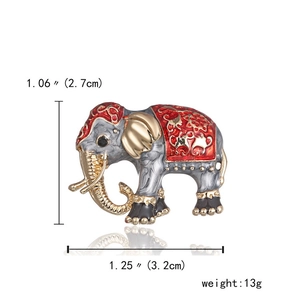 Detail showing enamel elephant brooch dimensions 3.2cm x 2.7cm and weight 13g on white background