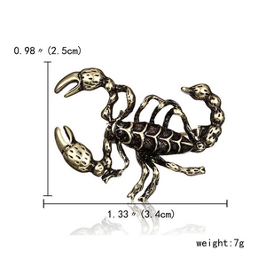Detailed view showing the scorpion brooch dimensions of 1.33 inches by 0.98 inches