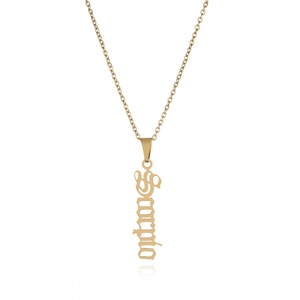 Macro shot of Scorpio gold zodiac pendant on a stainless steel necklace chain