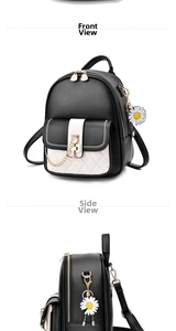 Detail of black PU leather backpack with white quilted pocket and cat heart zipper