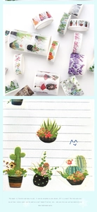 Detail of botanical and floral washi tape set on notebook with watercolor hand-drawn style