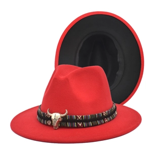 Red wool fedora hat with ethnic woven band and silver bull skull accessory for men and women