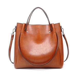 Retro brown oil wax leather bucket bag with large capacity and shoulder strap