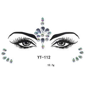 Detailed view of YT-112 acrylic face gems with 12.7g weight and iridescent rhinestone patterns