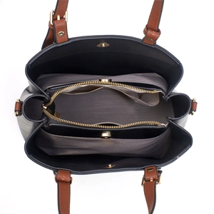 Top view showing multi-compartment interior and herringbone lining of tote bag