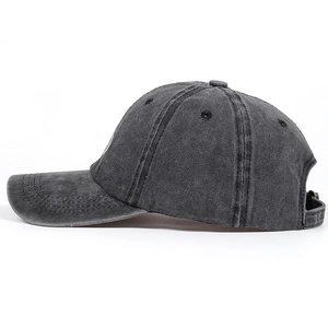 Detail showing high-quality cotton texture and stitching of vintage washed baseball cap