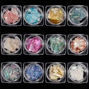 12 colors of natural iridescent shell flakes for nail art in separate square clear jars