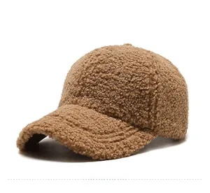 Detail view of the brown teddy fleece fabric on the plush baseball cap brim