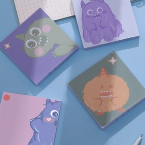 Detailed view of four sets of PET transparent sticky notes with cartoon monster designs
