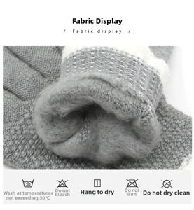 Close-up of gray knit gloves with thick plush lining and fabric care symbols