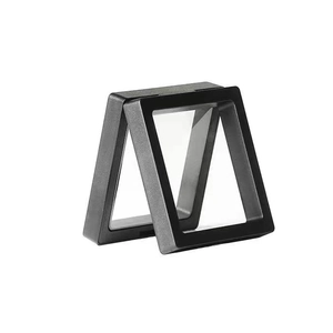 Detail of black PE film floating display boxes for jewelry and coins showing thin membranes