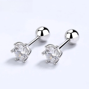 Macro detail of 925 silver six-prong stud earrings with secure screw-back ball closure