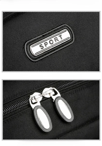 Detail of SPORT metal logo and smooth dual metal zippers on black oxford backpack