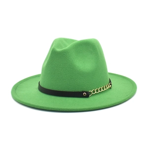Close-up of green wool fedora hat featuring a black band with gold chain link detail