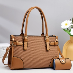 Vintage brown woven leather handbag set with gold hardware and matching coin purse