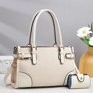 Elegant beige woven texture handbag and coin purse with luxury gold metal hardware details