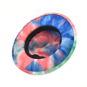 Internal view of colorful tie-dye wool fedora hat showing the black inner sweatband