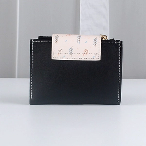 Minimalist black and pink PU leather fold wallet with floral pattern and gold zipper