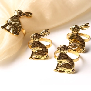 Set of 4 gold metal Easter bunny napkin rings with elegant textured rabbit design