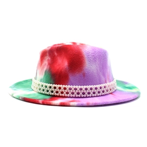 Detail of multi-color tie-dye fedora hat with triple-row pearl beaded hatband decoration
