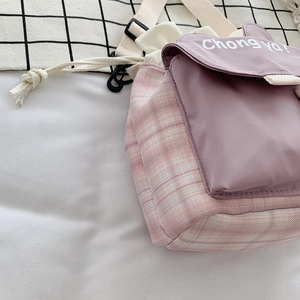 Cute purple and pink checkered canvas bucket bag with adjustable crossbody strap