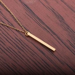 Polished gold rectangular bar pendant necklace on a minimalist stainless steel fine chain