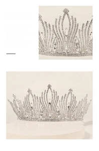 Macro detail of luxury silver bridal crown featuring intricate rhinestone leaf patterns